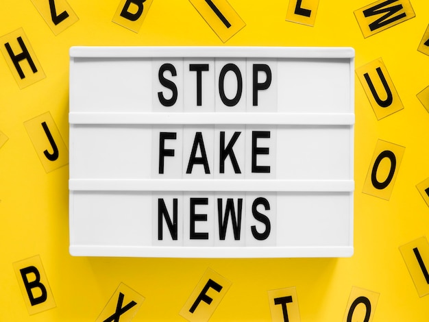 Stop making fake news letters on background