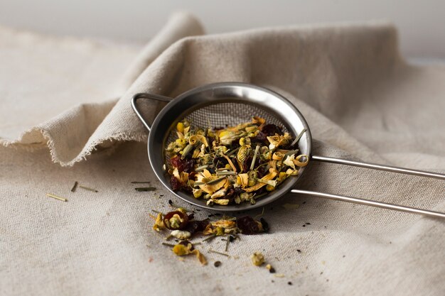 Strainer tea full of herbs