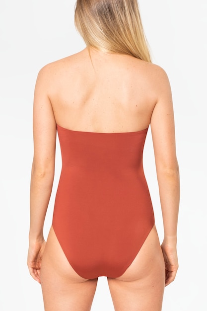 Free photo strapless orange swimsuit women's summer apparel with design space rear view