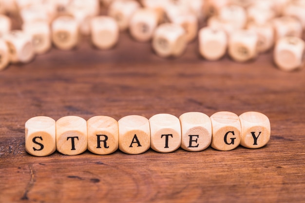 Free photo strategy word on wooden cubes