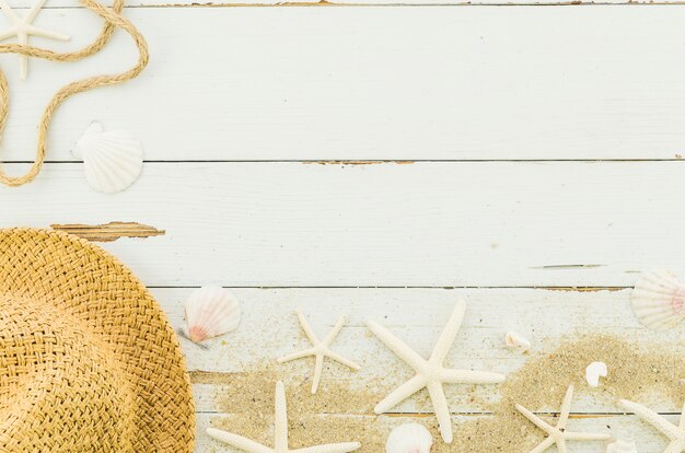 Straw hat with sea stars and shells