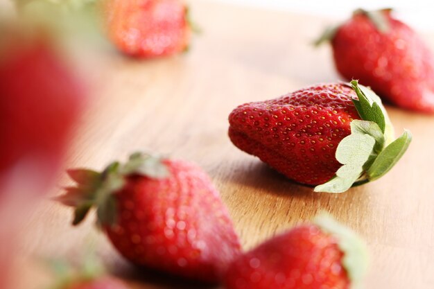 Strawberries on wooden surface