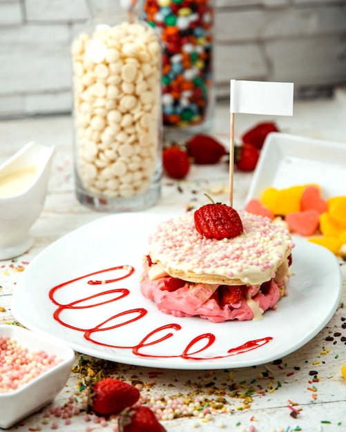 Strawberry and banana pancake covered in chocolate balls