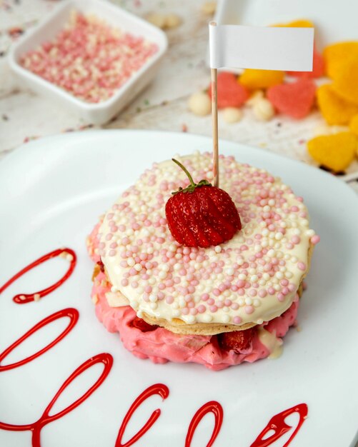 Strawberry and banana pancake covered in chocolate balls