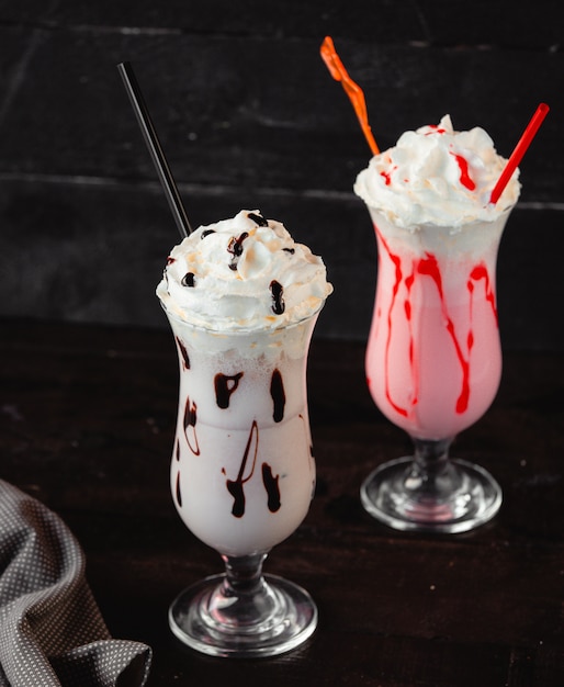 Strawberry and chocolate milk shake with cream