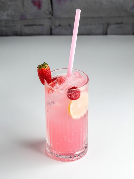 Strawberry cocktail garnished with strawberry and lemon slice