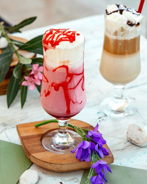 Strawberry cocktail glass garnished with strawberry syrup