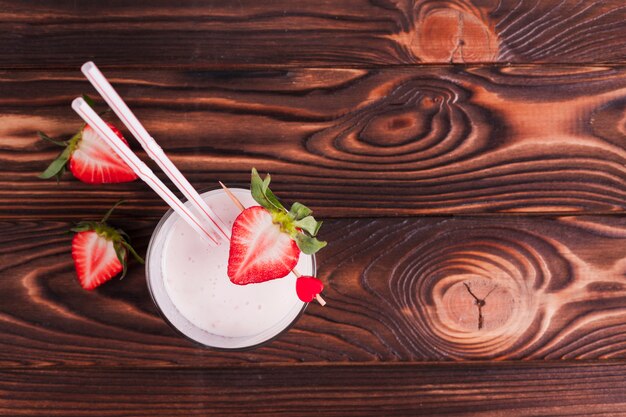 Strawberry cocktail on wooden surface
