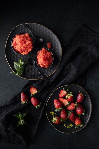 Strawberry granita dessert with mint top view