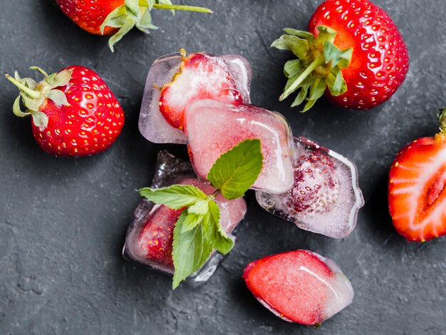 Strawberry in ice cubes