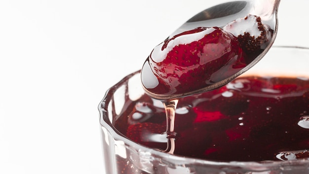 Strawberry jam in glass