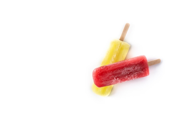 Strawberry and lemon popsicles isolated on white background