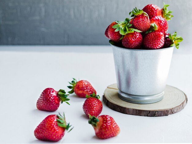 Strawberry in metal bucket