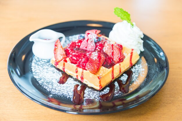 Strawberry and mix berry on top of waffle