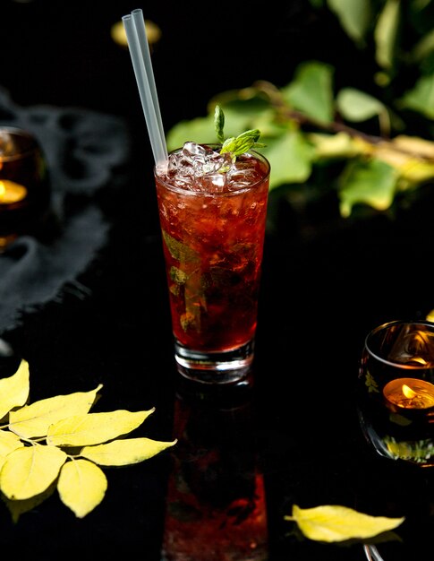 Strawberry mojito with ice and mint leaves