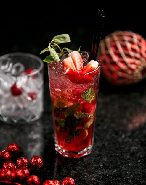 Strawberry mojito with ice on the table