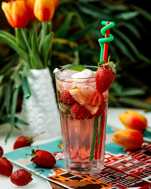 Strawberry mojito with ice on the table