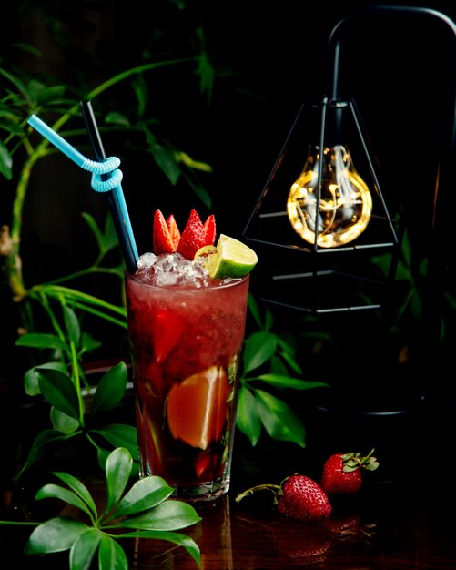 Strawberry mojito with ice on the table