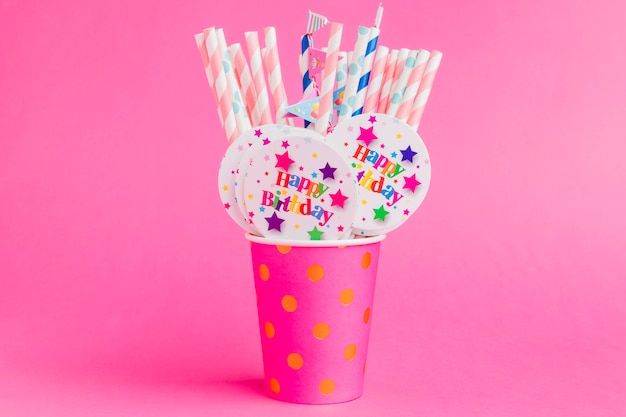 Free photo straws with badges in cup