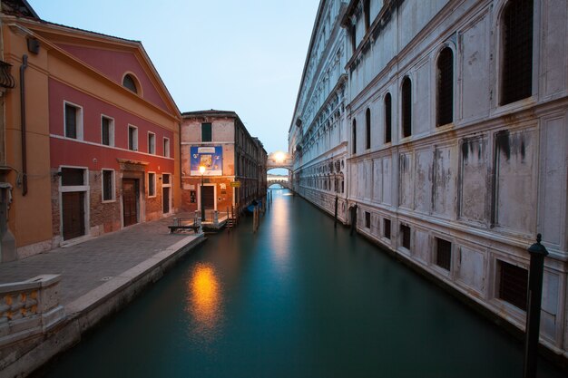 Street crossed by a canal