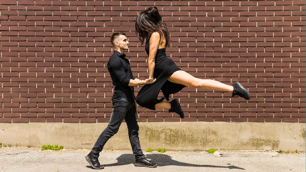 Free photo street dancers performing tango