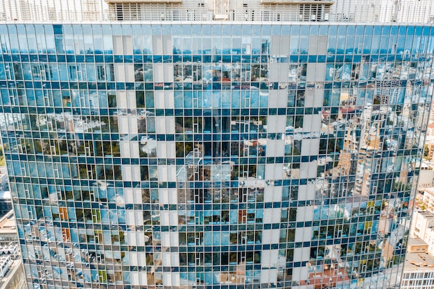 Street reflection on glass steel building facade