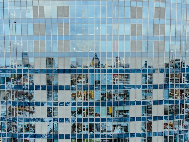 Free photo street reflection on glass steel building facade