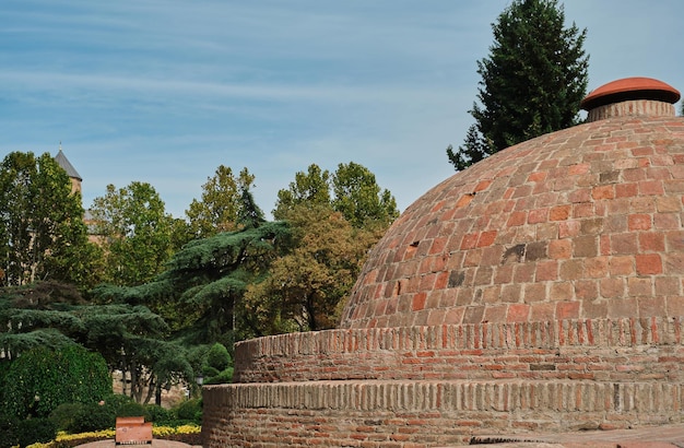 Streets of old Tbilisi Dome structures of an ancient thermal spa idea for postcard or advertisement