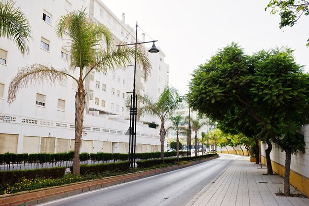 Streets with architecture of the resort town buildings and tropical greenery