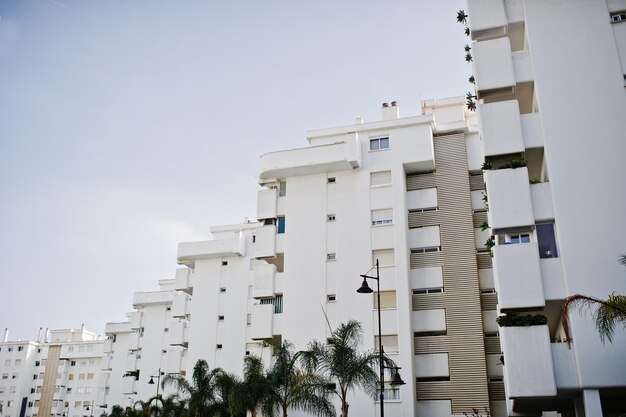 Streets with architecture of the resort town buildings and tropical greenery