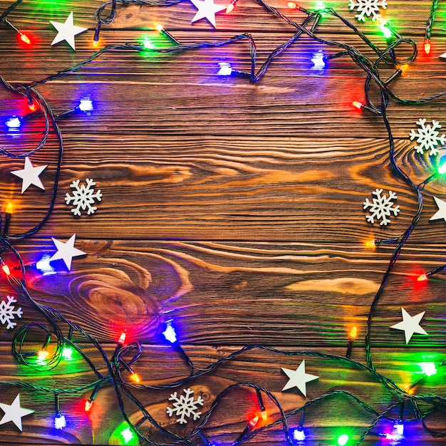 String lights on wooden surface