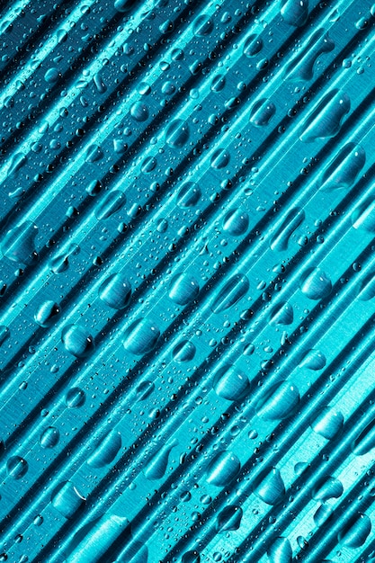 Striped blue metallic material background with rain drops