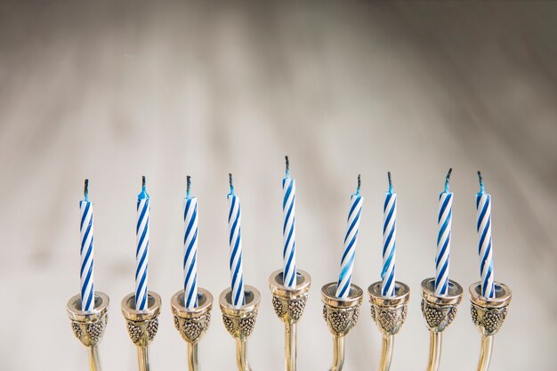 striped candles of menorah