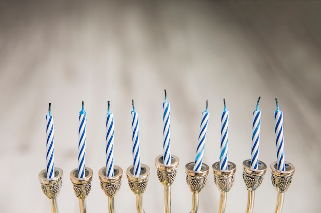 Striped candles of menorah