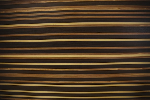 Striped pattern on wooden surface background