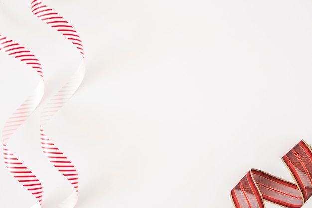 Striped ribbons on white background