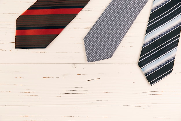 Striped ties on desk
