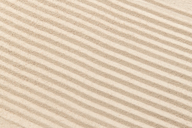 Striped zen sand background in health and wellbeing concept