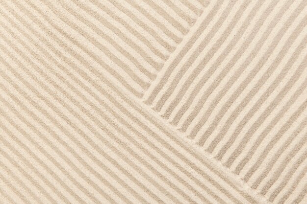 Striped zen sand background in health and wellbeing concept