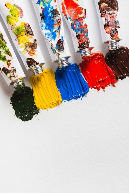 Free photo strokes of thick paints near containers