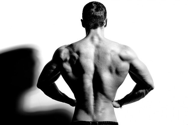 strong man back on black and white