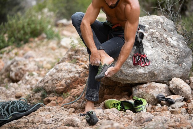 Strong man getting ready to climb