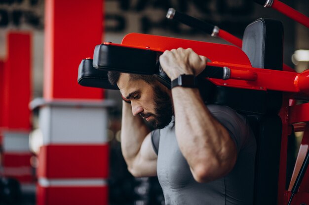 Strong man training in gym