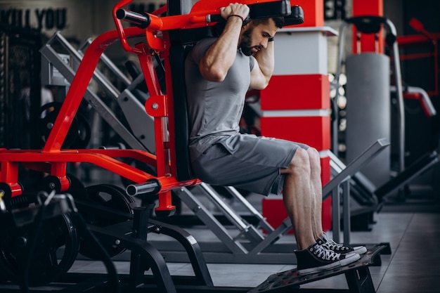 Strong man training in gym