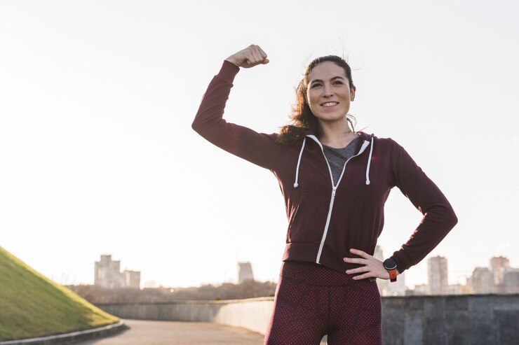 Free Photo strong young woman ready for training