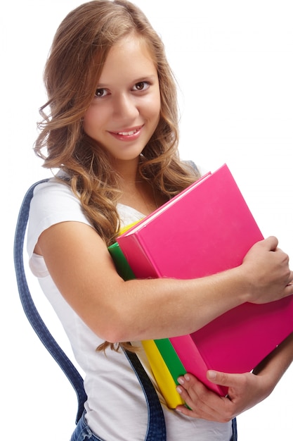 Free photo student carrying books