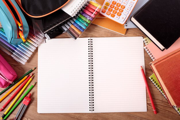 Student desk with open notebook 