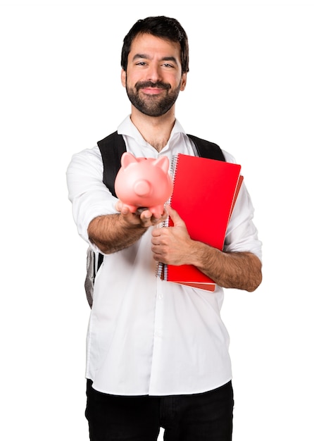 Student man holding a piggybank