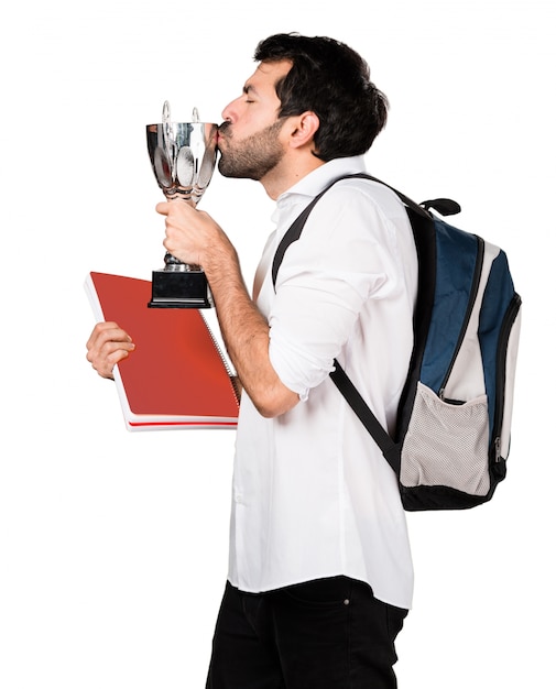 Student man holding a trophy