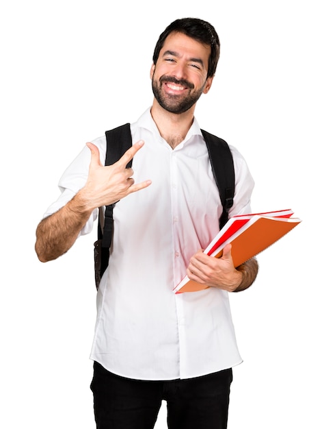 Student man making horn gesture